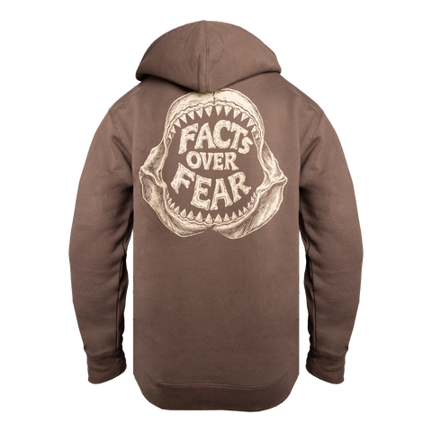 Rear view of brown hoodie with shark jawbone graphic with text "FACTS OVER FEAR"