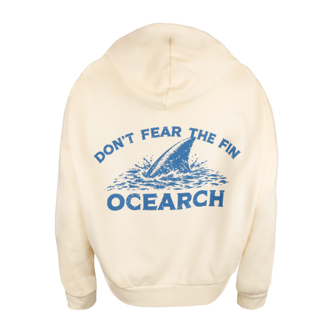 Rear view of bone hoodie with shark fin graphic and text "DON"T FEAR THE FIN OCEARCH"