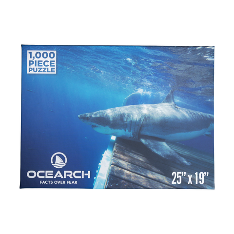 Ocearch 1000 piece puzzle with a shark and blue ocean background 25" x 19"