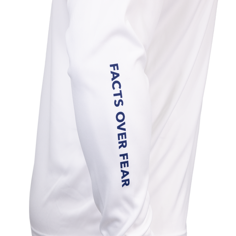 Closeup of sleeve of white Performance Hoodie showing navy "FACTS OVER FEAR" text