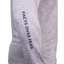 Closeup of sleeve of heather grey Performance Hoodie showing navy "FACTS OVER FEAR" text