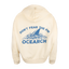 Rear view of bone hoodie with shark fin graphic and text "DON"T FEAR THE FIN OCEARCH"