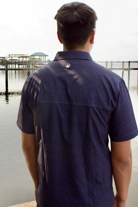 Rear view of man wearing paradise dark blue pattern buttondown
