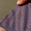 closeup of pattern on paradise dark blue pattern buttondown showing shark tooth pattern