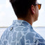 rear view of man in light blue Ocearch camo shirt