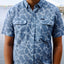 Man in light blue Ocearch camo shirt