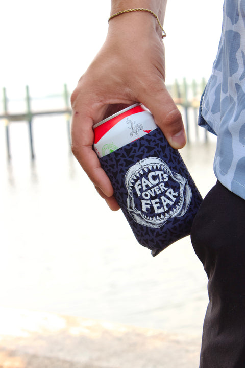 person holding drink in OCEARCH 12 OZ Can Cooler