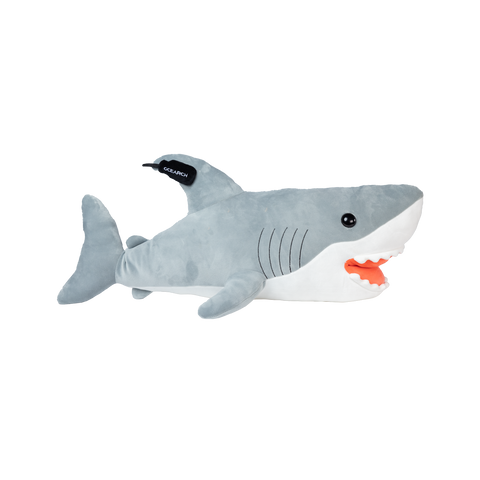 Plush shark with tracker on fin on a white background