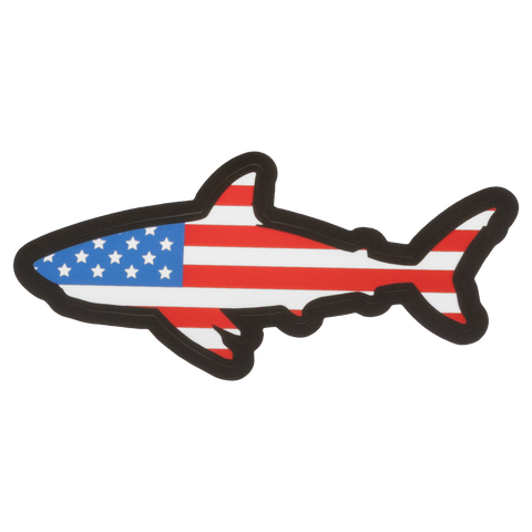 Shark-shaped object with American flag design on a white background
